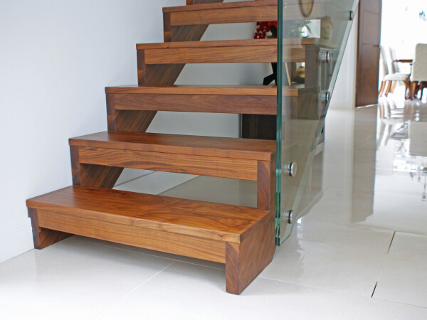 Open tread staircases with glass balustrade