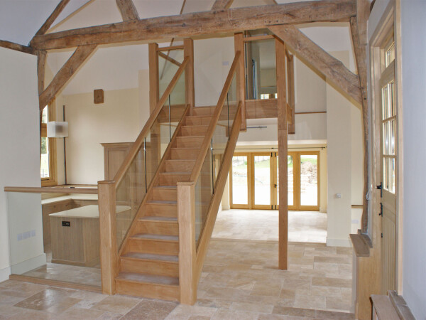 barn conversion with glass balustrade staircase