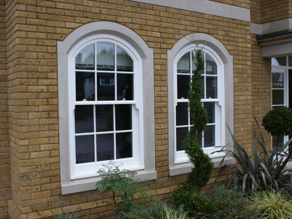 a pair of traditional sash sliding windows
