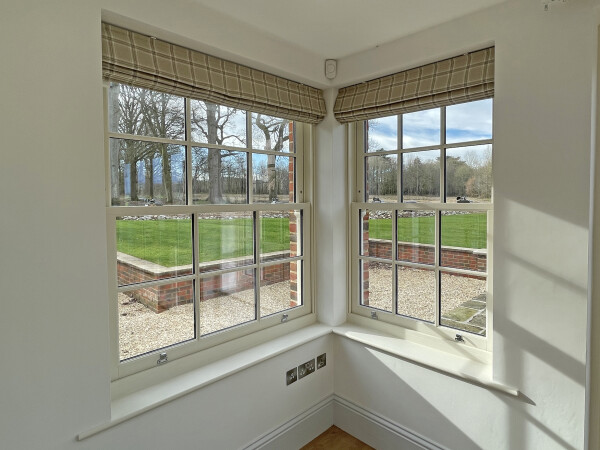 interior view of two corner sash windows