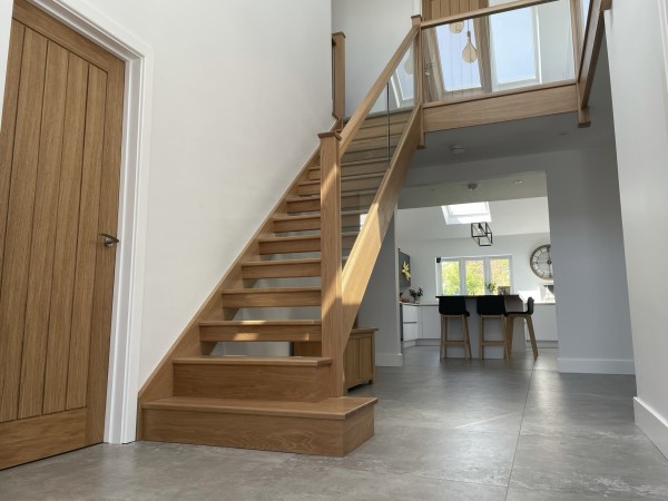 barn conversion with glass balustrade staircase
