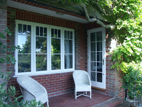 small front porch with stormproof window and door