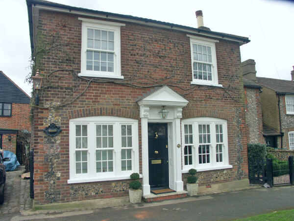 english brick cottage with sash windows