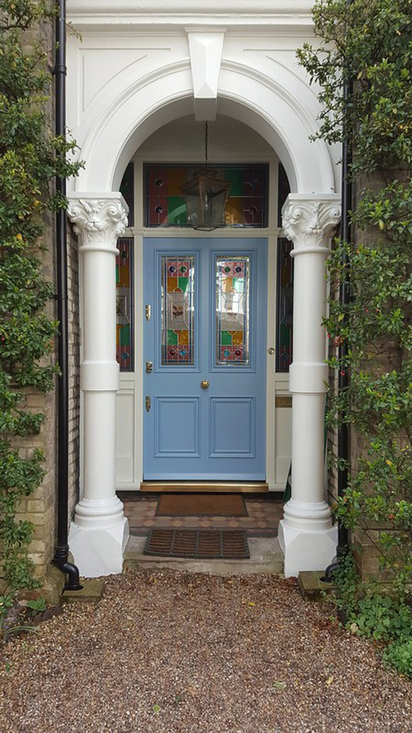 stained glass panel and timber front door