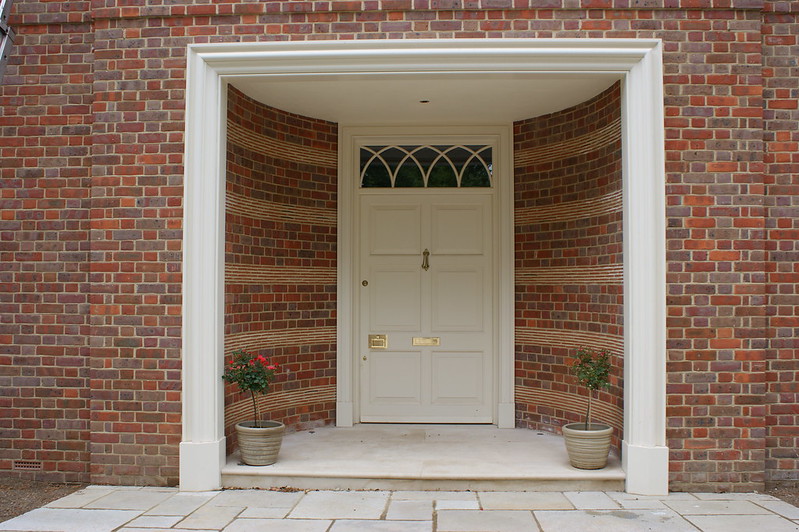 large white traditional timber front door